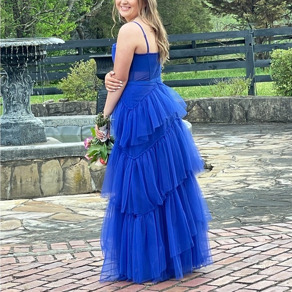 It is made of a mesh material, it is see through on the stomach only, blue dress - Picture 5 of 10